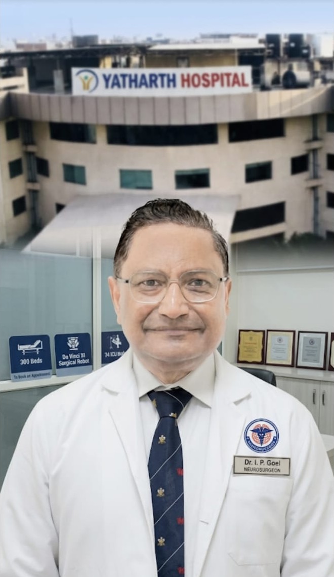 Portrait of Dr. Ishwar Prasad Goel in a white coat at Yatharth Hospital